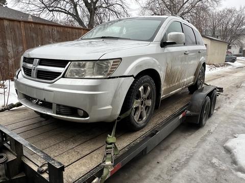 CashFor Cars | Dodge Journey on Trailer for Scrap Car Removal