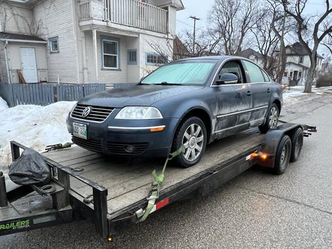 CashFor Cars | Scrap Volkswagen Jetta on Trailer for Junk Car Removal