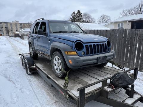 CashFor Cars | Jeep Liberty on Trailer for Scrap Metal Recycling